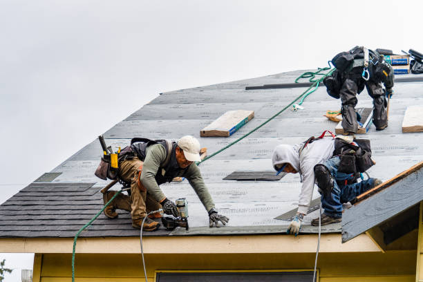 Professional Gutter Installation technician working in Springfield, OR